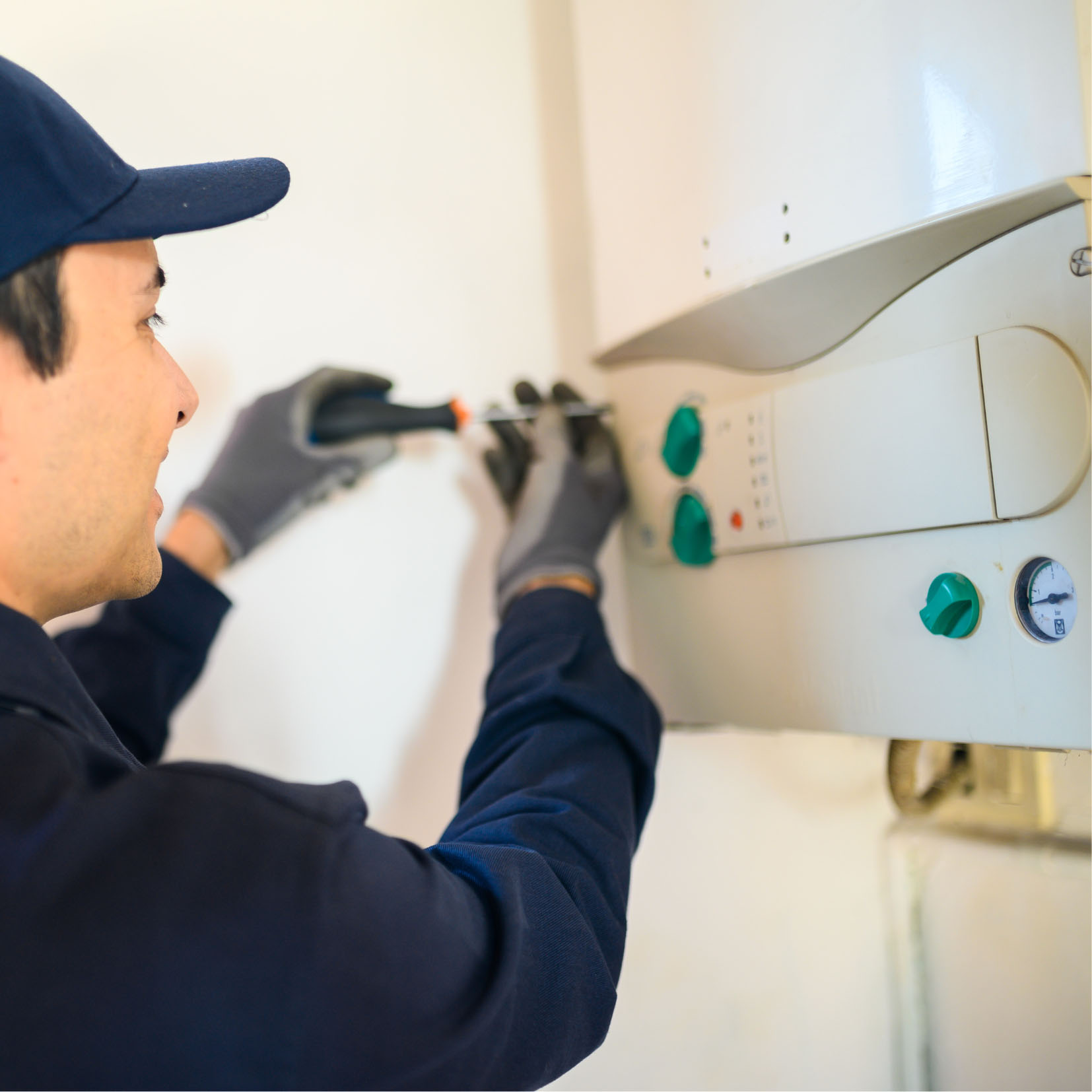 Technician Repairing Hot Water Machine — Appliance Services Repair in Singapore