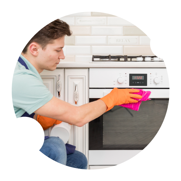 Man Cleaning a Microwave — Appliance Services Repair in Singapore