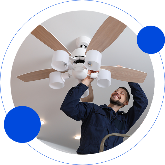 Technician Checking Ceiling Fan — Appliance Services Repair in Singapore